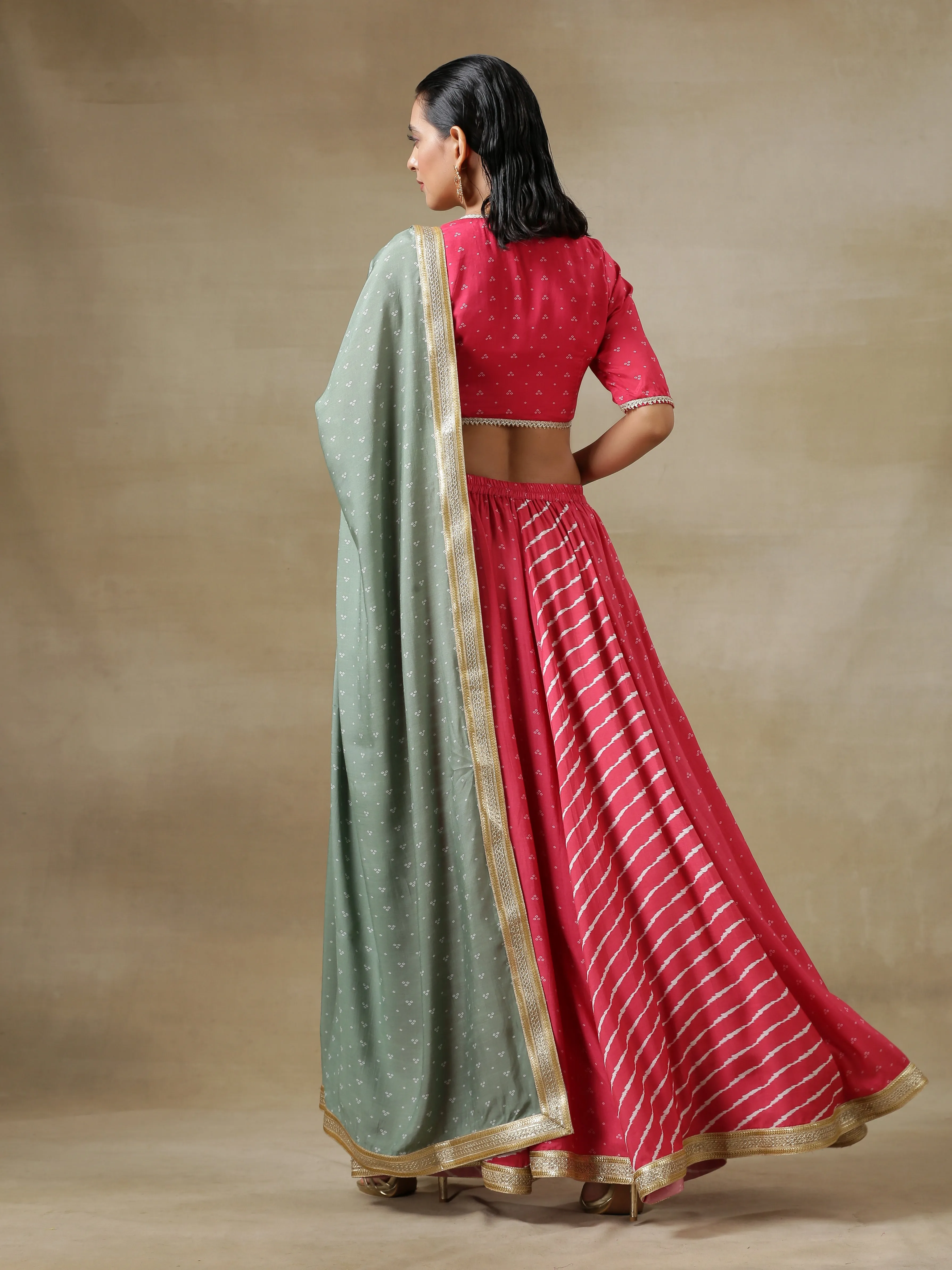 Pink Bandhani Printed Silk Top Skirt with Light Green Dupatta Set